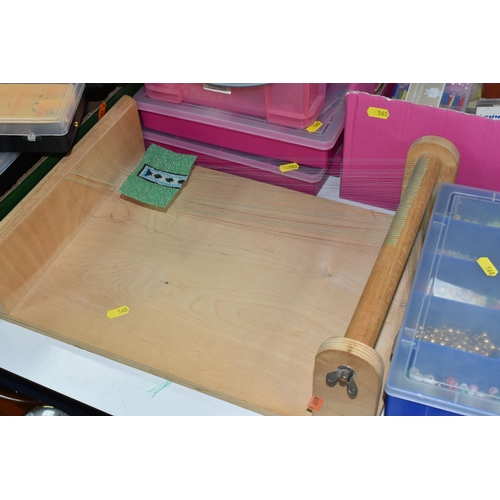 560 - TWO BOXES AND LOOSE GLASS AND PLASTIC BEADS AND BEADING LOOM, to include twelve plastic storage cont... 