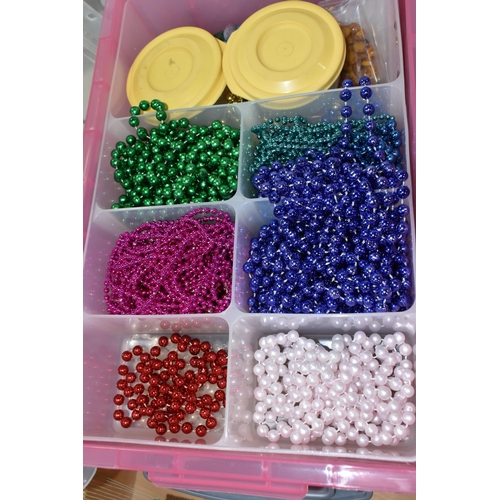 560 - TWO BOXES AND LOOSE GLASS AND PLASTIC BEADS AND BEADING LOOM, to include twelve plastic storage cont... 