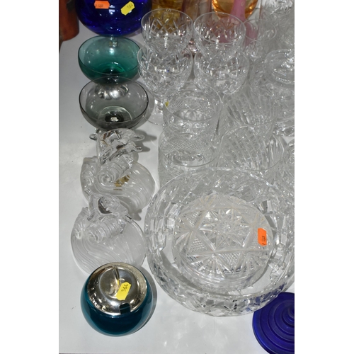 564 - A LARGE QUANTITY OF CUT CRYSTAL AND GLASSWARE, comprising a boxed Dartington Crystal contemporary de... 