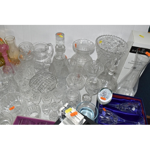 564 - A LARGE QUANTITY OF CUT CRYSTAL AND GLASSWARE, comprising a boxed Dartington Crystal contemporary de... 