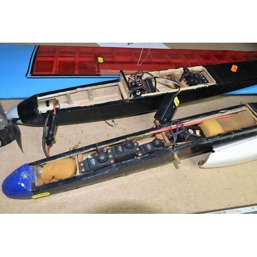 567 - A SMALL QUANTITY OF REMOTE CONTROLLED AIRCRAFT EQUIPMENT, including two plane fuselages, a Sanwa Con... 