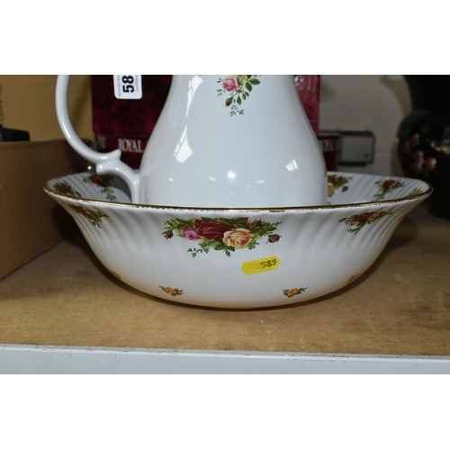 589 - A LARGE BOXED ROYAL ALBERT 'OLD COUNTRY ROSES' PATTERN WASH JUG AND BOWL, stoneware still has applie... 