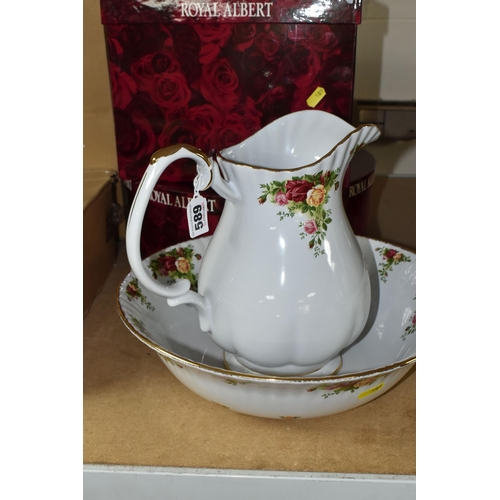 589 - A LARGE BOXED ROYAL ALBERT 'OLD COUNTRY ROSES' PATTERN WASH JUG AND BOWL, stoneware still has applie... 