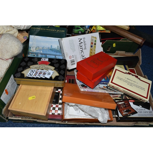 594 - FOUR BOXES AND LOOSE VINTAGE TOYS, GAMES AND DOLLS, to include a box of six Mensa puzzle classics, a... 