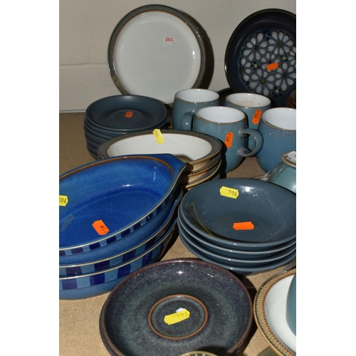 596 - A LARGE COLLECTION OF DENBY TABLEWARE, comprising five 'Luxor' design cups and five saucers, four di... 