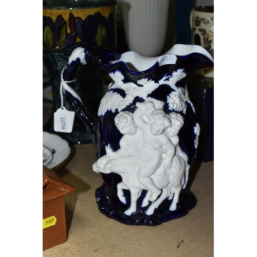 597 - A GROUP OF CERAMICS, comprising a Morris Ware vase decorated in a blue, green and purple fish  and w... 