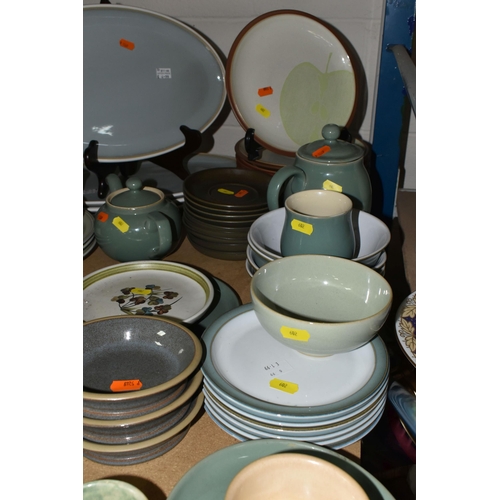 602 - A QUANTITY OF DENBY AND DENBY STYLE TABLEWARES, to include Denby Juice Fruits plates, four 40cm oval... 