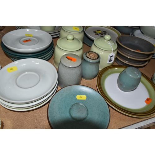 602 - A QUANTITY OF DENBY AND DENBY STYLE TABLEWARES, to include Denby Juice Fruits plates, four 40cm oval... 