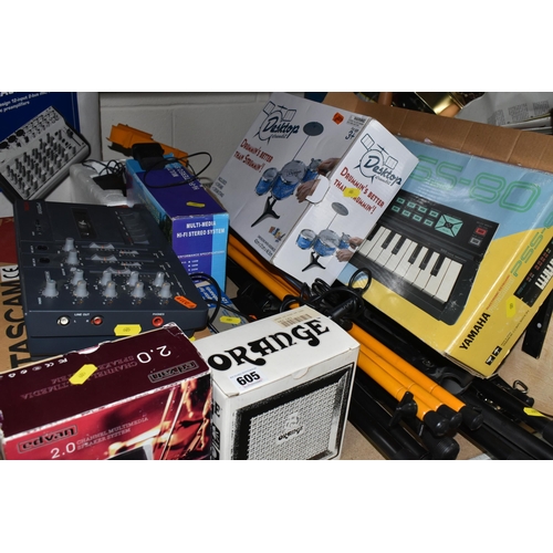 605 - MUSICAL INSTRUMENT ACCESSORIES, to include a boxed Orange Micro Crush guitar amplifier, Tascam minis... 