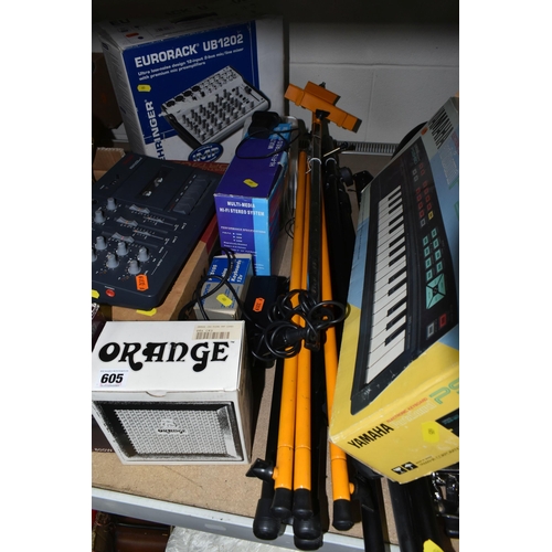 605 - MUSICAL INSTRUMENT ACCESSORIES, to include a boxed Orange Micro Crush guitar amplifier, Tascam minis... 