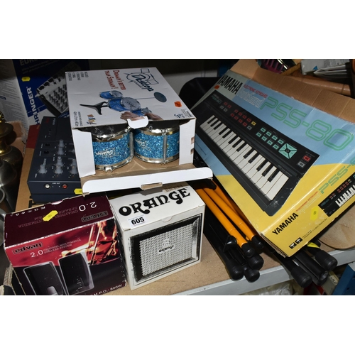 605 - MUSICAL INSTRUMENT ACCESSORIES, to include a boxed Orange Micro Crush guitar amplifier, Tascam minis... 