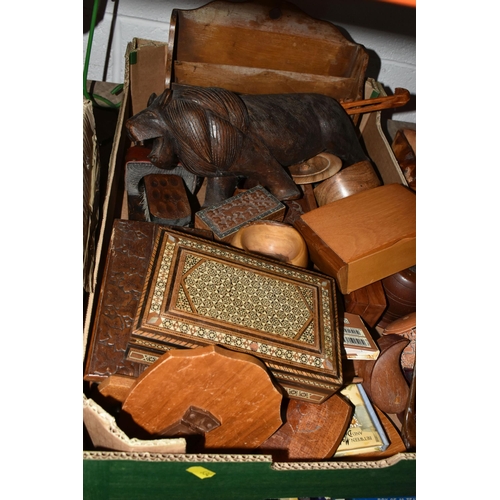 634 - FOUR BOXES/BASKET AND LOOSE TREEN AND SUNDRIES, to include a carved wooden lion and Rino, cigarette ... 