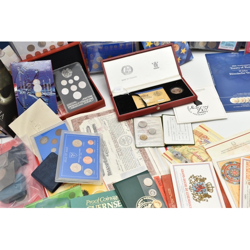 215 - A PLASIC STORAGE BOX OF WORLD COINAGE, to include a volume by The Franklin Mint, Great Historic coin... 