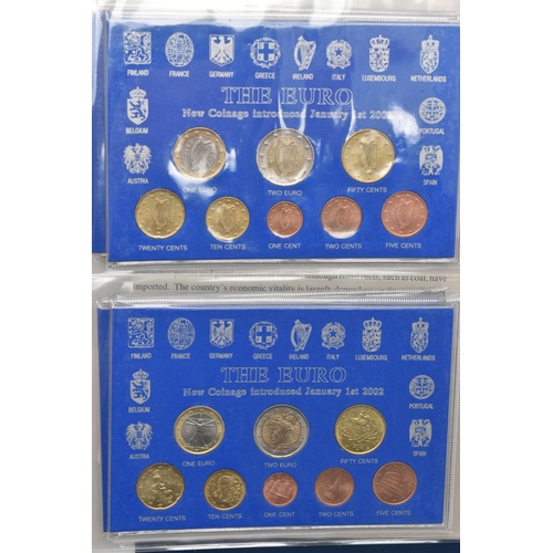 215 - A PLASIC STORAGE BOX OF WORLD COINAGE, to include a volume by The Franklin Mint, Great Historic coin... 