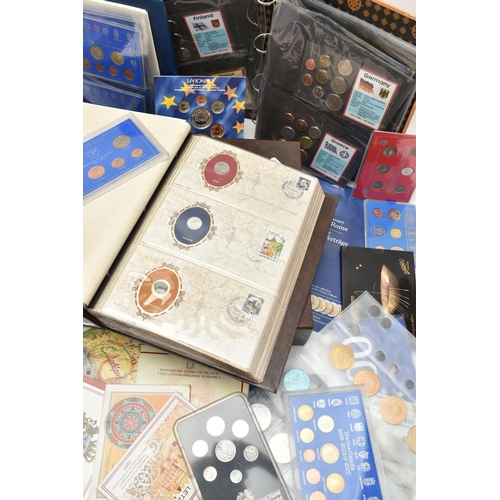 215 - A PLASIC STORAGE BOX OF WORLD COINAGE, to include a volume by The Franklin Mint, Great Historic coin... 