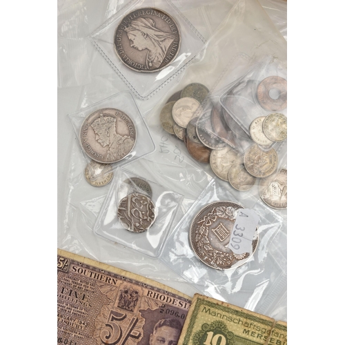 217 - A TIN CONTAINING MIXED WORLD COINS, to include 1890s Japan One Yen, Silver Rupee Hyderabad, 1900 LX1... 