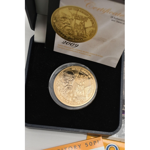 223 - FIVE COINS, to include a boxed 2009 Tristan Da Cunha, silver and gold plated Charles Darwin five pou... 