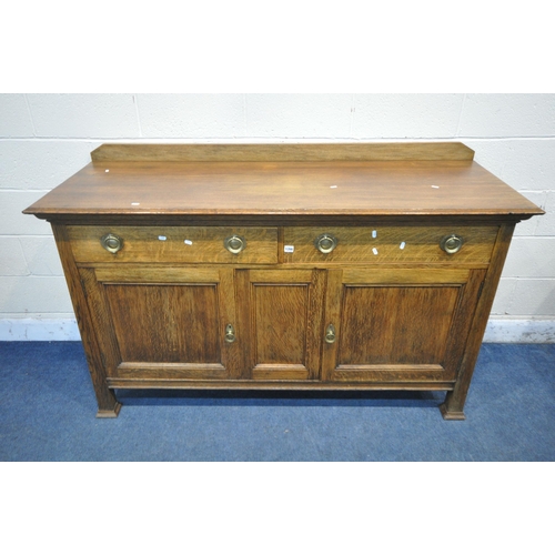 1199 - A 20TH CENTURY OAK SIDEBOARD, with a raised back, two drawers, above two cupboard doors, length 168c... 