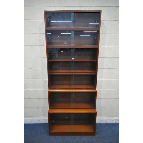 1201 - A 20TH CENTURY SIMPLEX SIX SECTION MAHOGANY STACKING BOOKCASE, all sections with double sliding glas... 