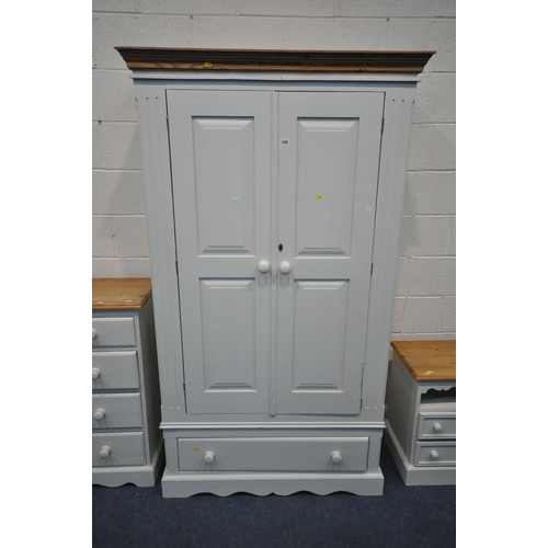 1205 - A PARTIALLY PAINTED PINE DOUBLE DOOR WARDROBE, with a single drawer, width 113cm x depth 53cm x heig... 