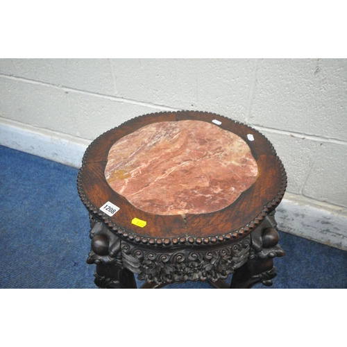 1208 - TWO CHINESE HARDWOOD SIDE TABLES, each with a pink marble insert, intricate carved details to apron ... 