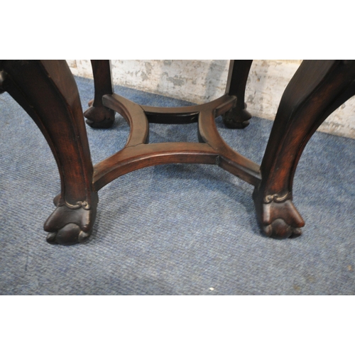 1208 - TWO CHINESE HARDWOOD SIDE TABLES, each with a pink marble insert, intricate carved details to apron ... 