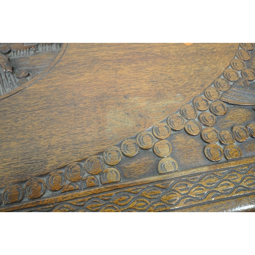 1223 - A 20TH CENTURY CAMPHORWOOD BLANKET CHEST, with detailed carving, depicting, ships, dragons, etc, wid... 