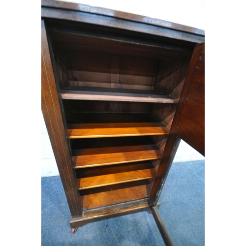 1224 - A VICTORIAN ROSEWOOD MUSIC CABINET, with a raised back, the single drawer with marquetry inlaid pane... 