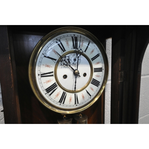 1234 - A LATE 19TH CENTURY REGULATOR WALL CLOCK, the arched glass door enclosing a brass and enamel 8 inch ... 