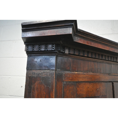 1237 - A LARGE GEORGIAN OAK CORNER CUPBOARD, with four cupboard doors, width 100cm x depth 62cm x height 21... 