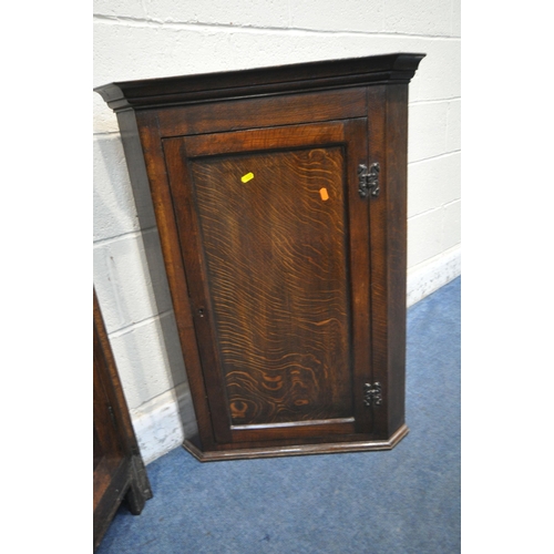 1237 - A LARGE GEORGIAN OAK CORNER CUPBOARD, with four cupboard doors, width 100cm x depth 62cm x height 21... 