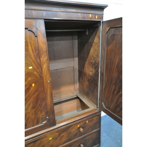 1239 - A 19TH CENTURY MAHOGANY LINEN PRESS, fitted with double cupboard doors, above two drawers, width 129... 