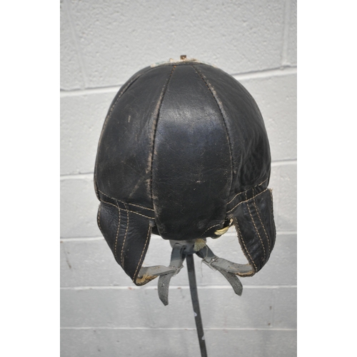 1251 - FRANK BRYAN LTD OF WORCESTER, AN EARLY 20TH CENTURY PUNCH BAG, with leather inflatable bag, with spr... 