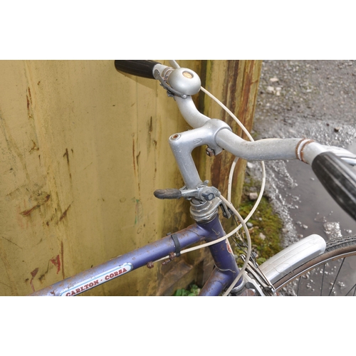 1001 - A VINTAGE PUCH PRIMA GENTS BIKE with 5 speed Simplex gears and 23in frame along with a vintage Carlt... 