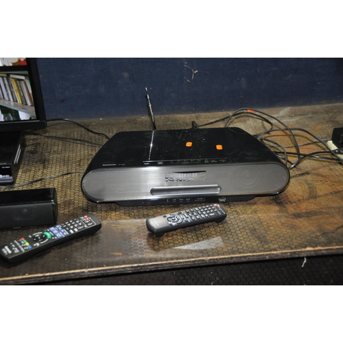 1055 - A LINSAR 24LED1700 24in SMART TV WITH REMOTE, a Panasonic DMR-BW780 Blu ray player with remote, a Pa... 