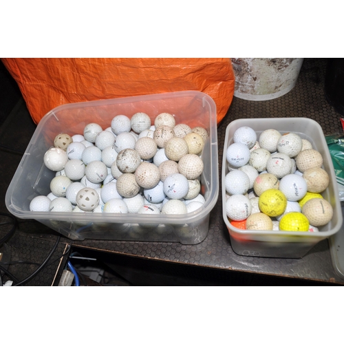 1060 - A COLLECTION OF GOLF BALLS AND ACCESSORIES including a large quantity of used golf balls, twelve tri... 