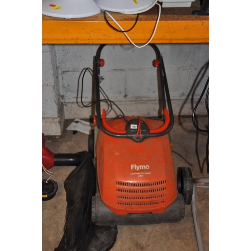 1082 - A FLYMO LAWN SCARIFIER, a Grizzly garden shredder and a Performance Power garden blower/vac (all PAT... 