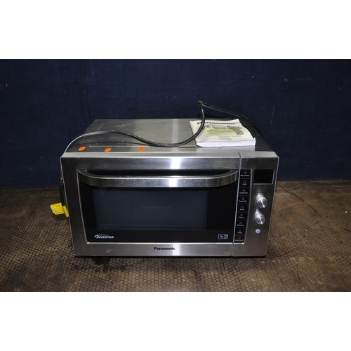 1085 - A PANASONIC NN-CF778S INVERTER MICROWAVE with stainless steel front and sides (PAT pass and working)