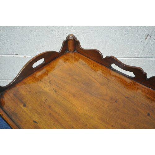 1263 - A GEORGIAN MAHOGANY BEDSIDE TRAY TOP COMMODE, with twin handles, a hide and fall door, above a pull ... 