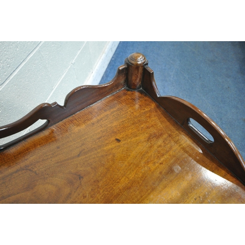 1263 - A GEORGIAN MAHOGANY BEDSIDE TRAY TOP COMMODE, with twin handles, a hide and fall door, above a pull ... 