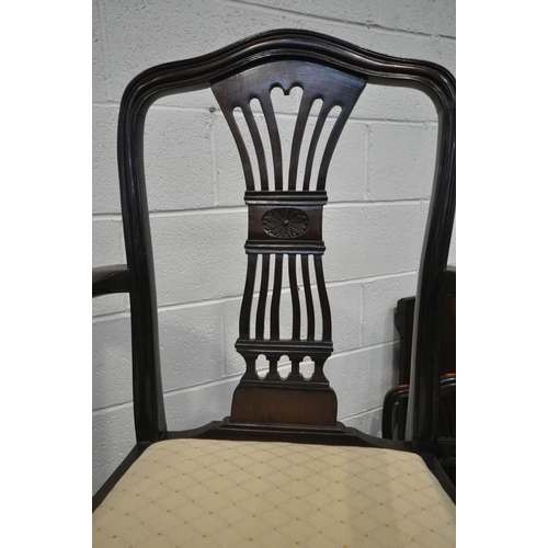 1264 - AN EARLY 20TH CENTURY MAHOGANY OVAL WIND OUT DINING TABLE, with two additional leaves, on square tap... 