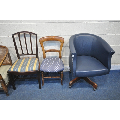 1275 - A 20TH CENTURY SWIVEL TUB OFFICE CHAIR, with dark blue leather upholstery, two French armchairs, a d... 