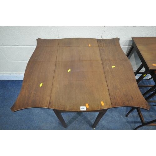 1282 - A GEORGIAN MAHOGANY SERPENTINE DROP LEAF TABLE, with a single frieze drawer, raised on square legs a... 