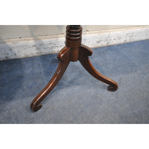 1283 - A GEORGIAN STYLE OAK CIRCULAR TRIPOD TABLE, raised on a turned support with spiral detail and three ... 