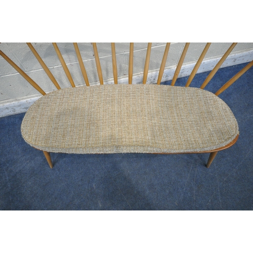 1291 - LUCIAN ERCOLANI, ERCOL, A MID CENTURY ELM AND BEECH DINING LOVE SEAT, with bentwood and spindle back... 