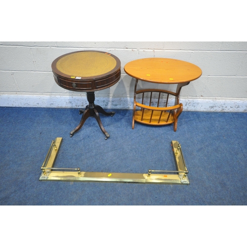 1295 - A 20TH CENTURY MAHOGANY DRUM TABLE, with tanned leather surface, turned support, on four legs, a mag... 