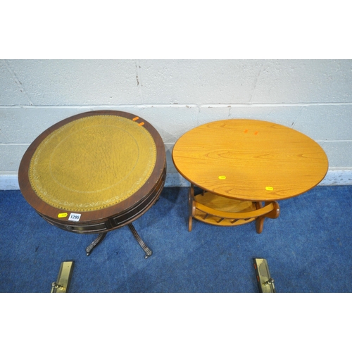 1295 - A 20TH CENTURY MAHOGANY DRUM TABLE, with tanned leather surface, turned support, on four legs, a mag... 