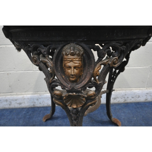 1306 - ANSELLS BREWERY LTD, ASTON, A 19TH CENTURY CAST IRON PUB TABLE, with circular wooden top, foliate an... 