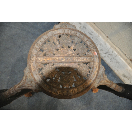 1306 - ANSELLS BREWERY LTD, ASTON, A 19TH CENTURY CAST IRON PUB TABLE, with circular wooden top, foliate an... 