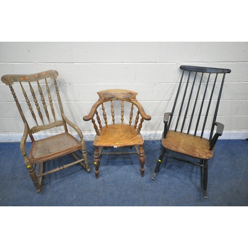 1309 - A LATE 19TH / EARLY 20TH CENTURY BOW TOP CAPTAINS CHAIR, with spindled back, dished seat, raised on ... 